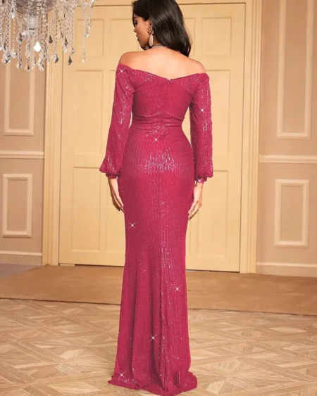 موضة فساتين سهرة بتصميم أنثوي كلاسيكي مستوحى من جمال حوريات البحر، بكتف مكشوف ولمسة ترتر راقية