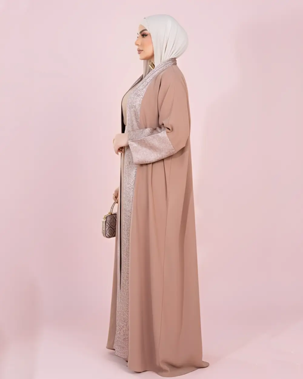 تسوقي أرقى عبايات موضة نسائية كريب بلمسات الشامبين طقم حقيبة 3 عباية كريب فاخرة للمناسبات من متجر زيلينا.