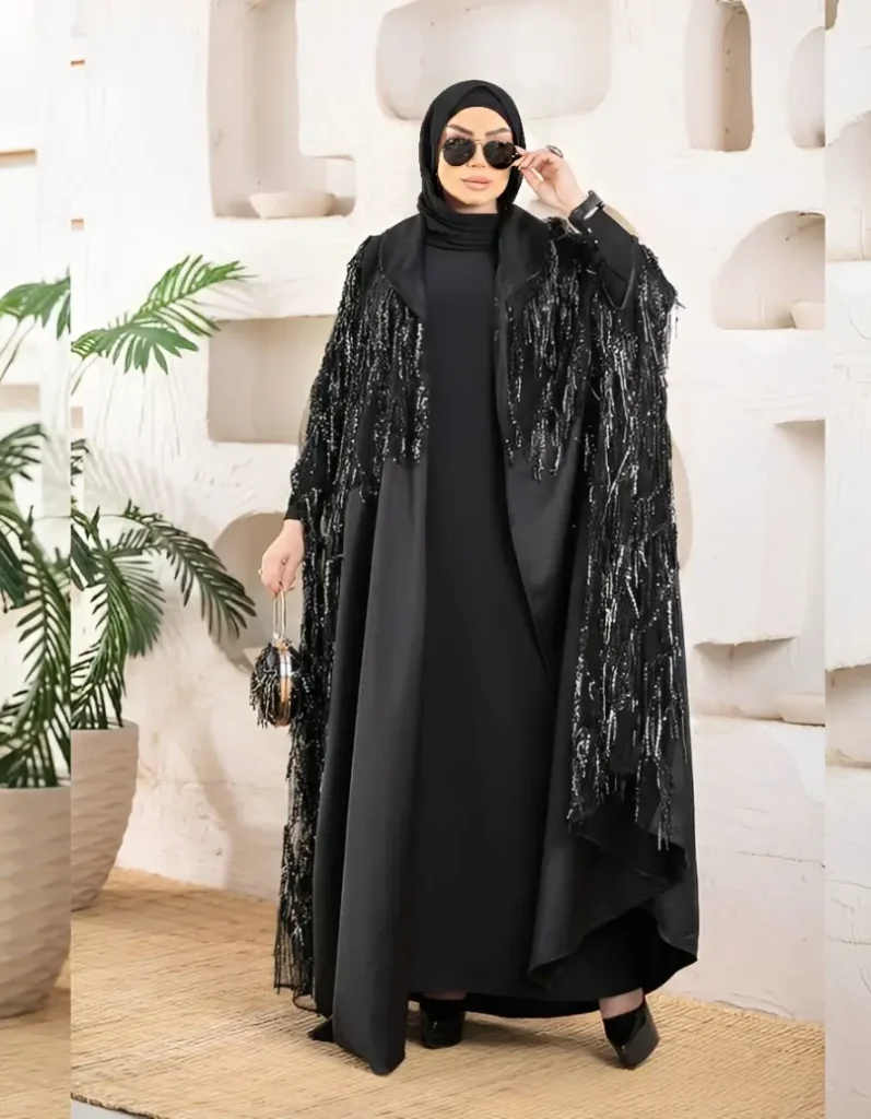 فساتين سهرة للمحجبات أناقة محتشمة تلفت الأنظار من زيلينا 🧵 4 فساتين محجبات موضة عباية سواريه سوداء ساتان الترامودا بتطريز شراشيب خرز واجهة أمامية