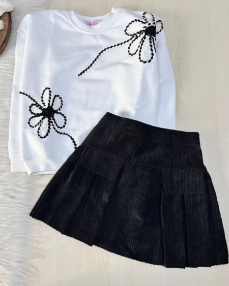 طريز يدوي راقٍ على سويت شيرت شتوي بناتي.